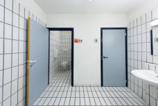 Hallenbad Meranarena - Toilette Tribüne